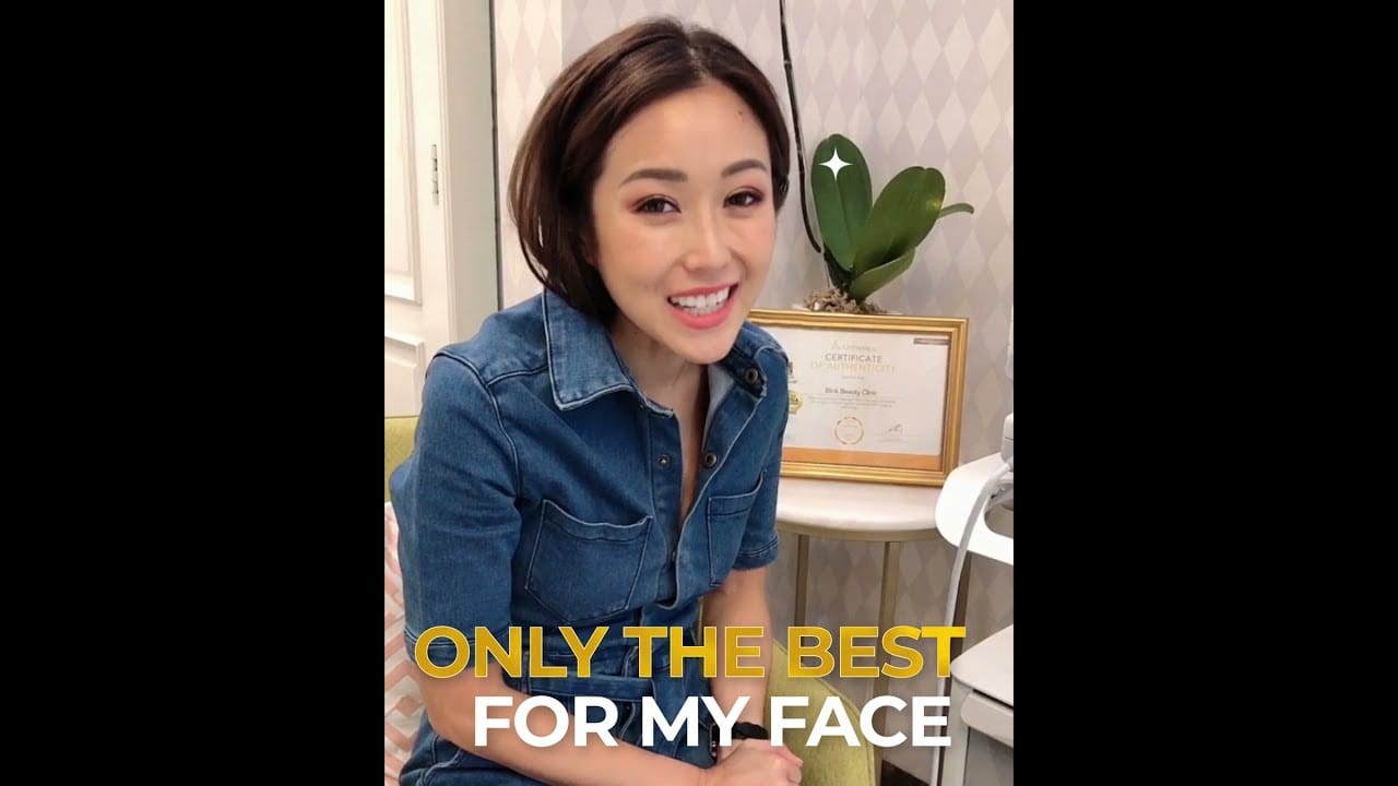 Ling Ling Bakrie smiling giving a testimonial at Blink Beauty Clinic.